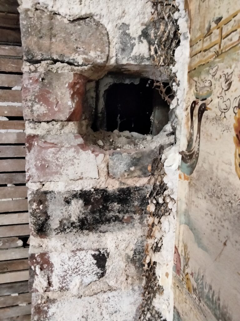 non sealed chimney in wall smoke anyone